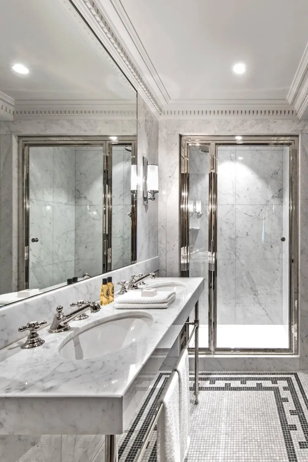 Bal Harbour penthouse primary bathroom — Italian marble and custom finishes by Cappelli Interiors